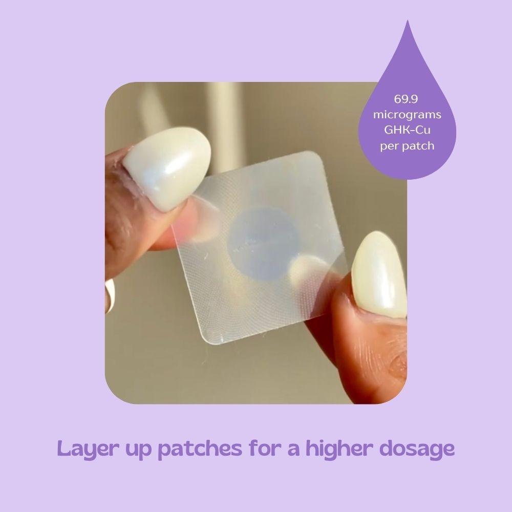 Hand holding a clear adhesive patch with text about dosage on a purple background